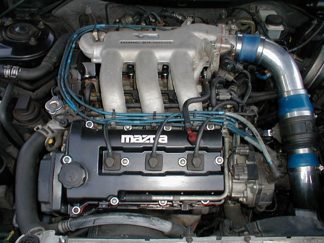 I changed valve cover gaskets and intake manifold gaskets this weekend. Also, while it was apart, painted the valve covers black. Look at the beautiful masking job on the Fazda logo.