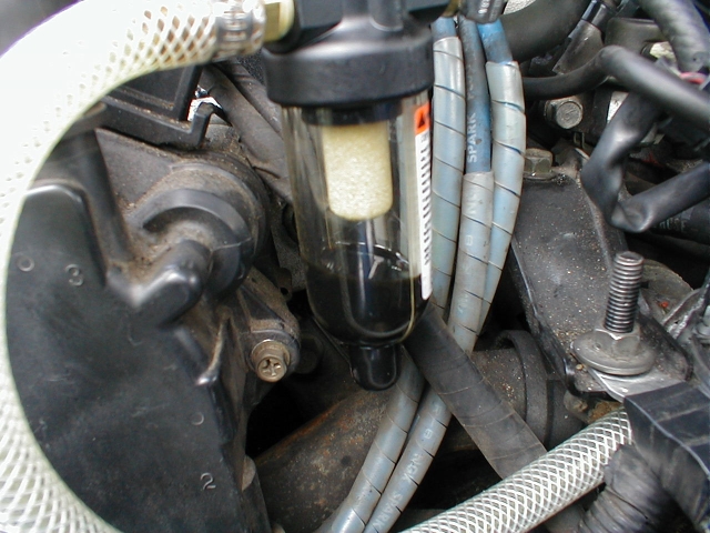 Here is an update, 14 days and 344 miles later... I mispoke when calling this an OIL catch tank. That, friends, is black gasoline. PURE gasoline.